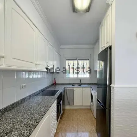 木屋 Beautiful Adosado Con Piscina Comunitaria 德尼亚